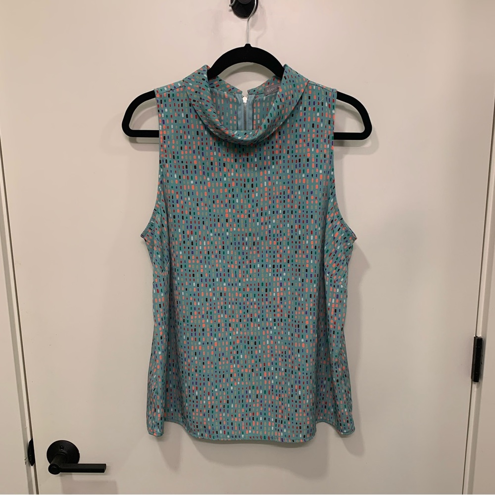 Olivia Moon blue sleeveless blouse with multi dot pattern, size L.